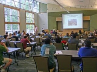 students seated in the auditorium