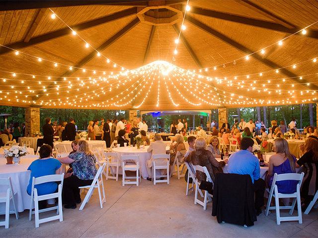 wedding reception at night in the pavillion