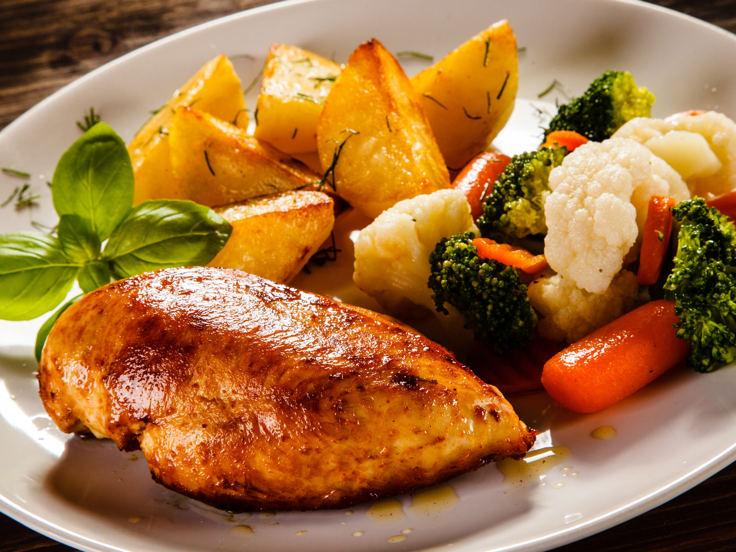 Fried chicken fillet and vegetable salad