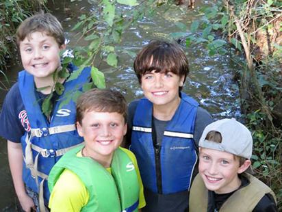 boys in life vests