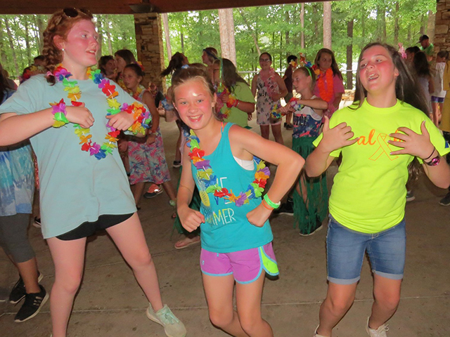 campers dancing the night away